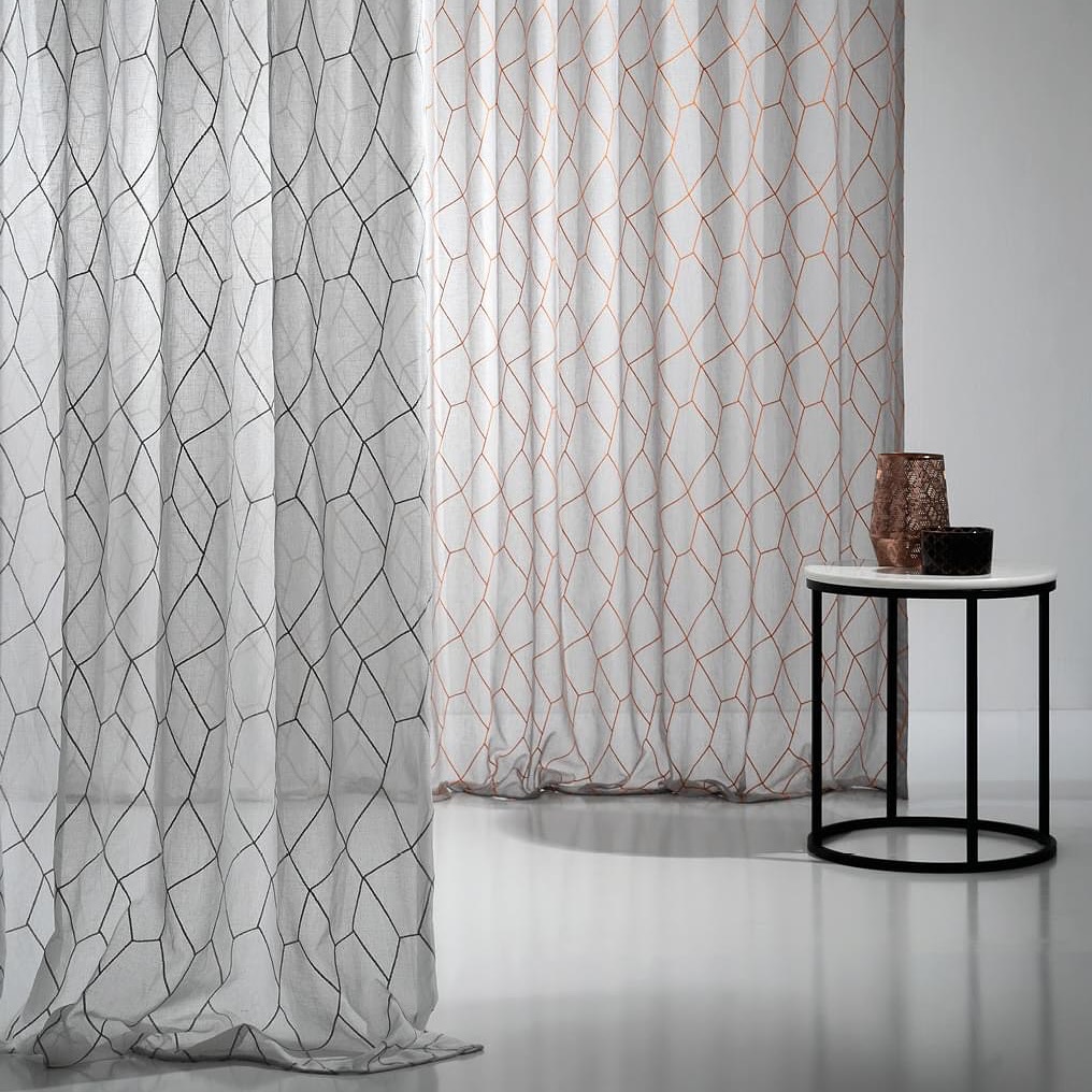 Patterned curtain detail with side table